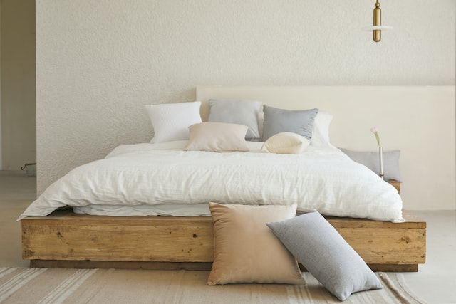 Minimalist bed with neutral pillows